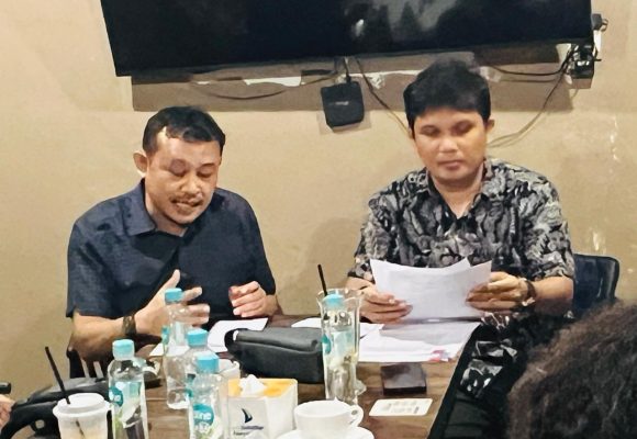 Hendrik A. Sinaga, S.H., M.H. dan Juan Sahata, S.H.